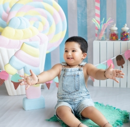 pastel colours for first birthday boy photoshoot